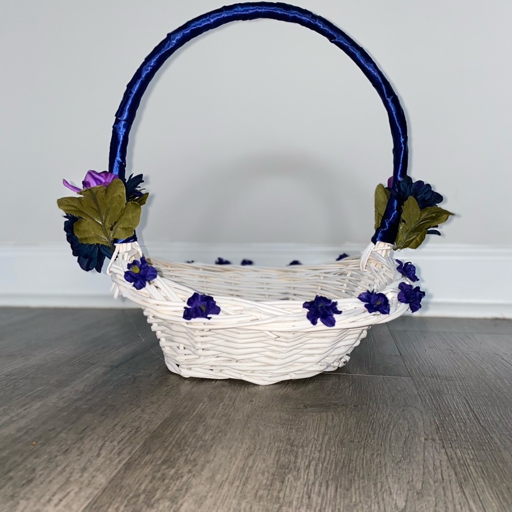 Flower girl basket with blue accents and purple flowers